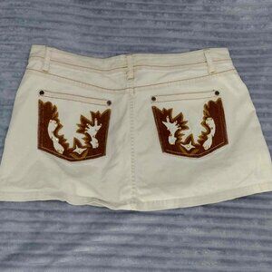 Vintage size 11/12 beige denim mini skirt by Squeeze Jeans